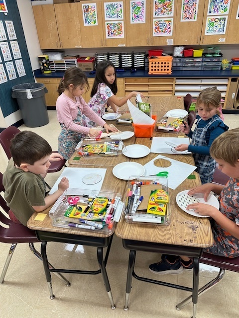 Students working on wildflowers in art.