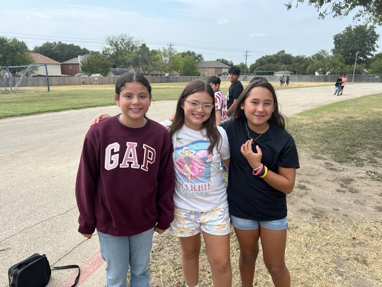 6th grade girls enjoying recess.