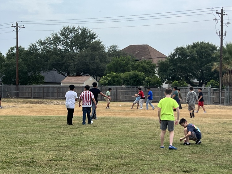 kids playing on the soccer field.