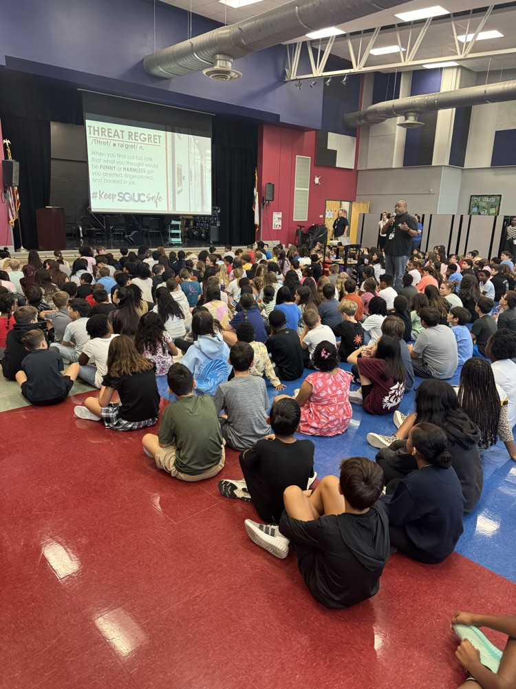students sitting for assembly