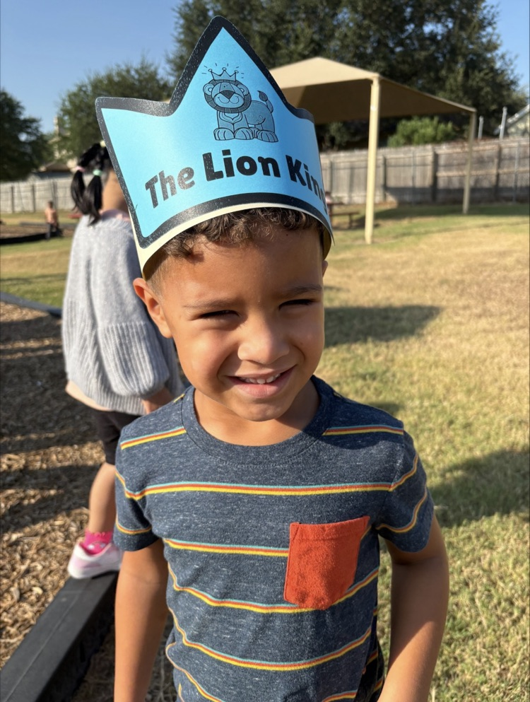 students wearing paper crown