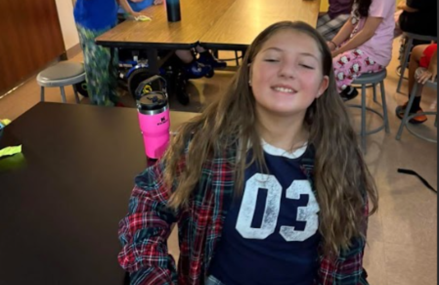6th grade student in class with pajamas