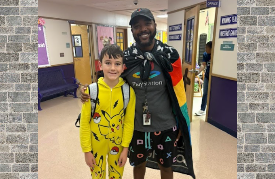 Coach Pitts and student with pajamas