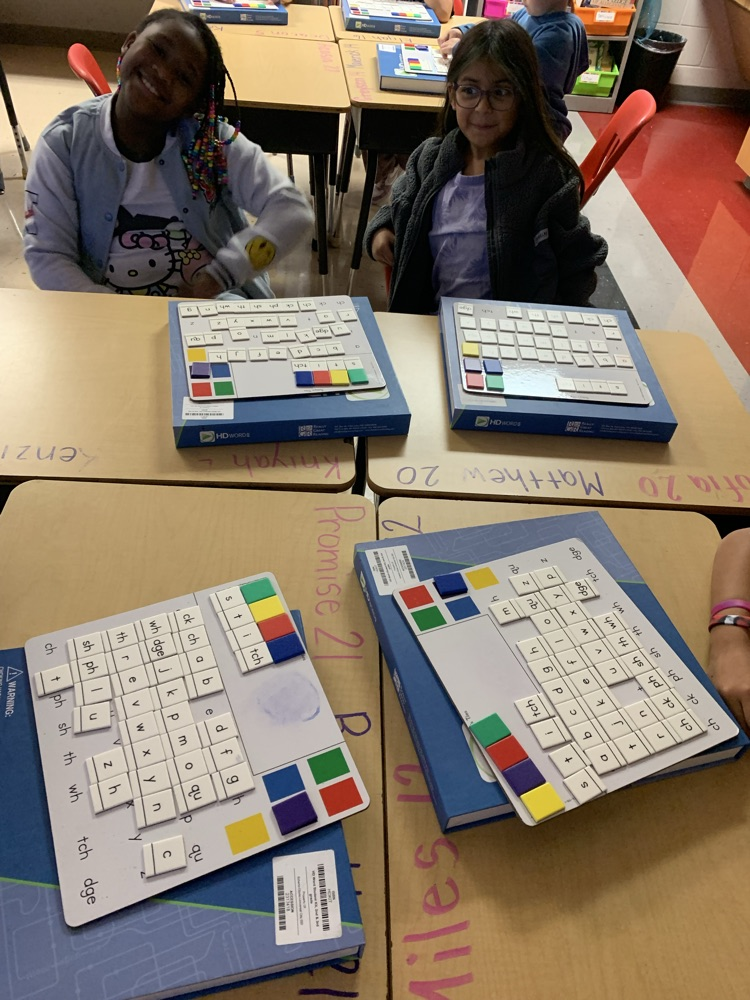 students working on building words