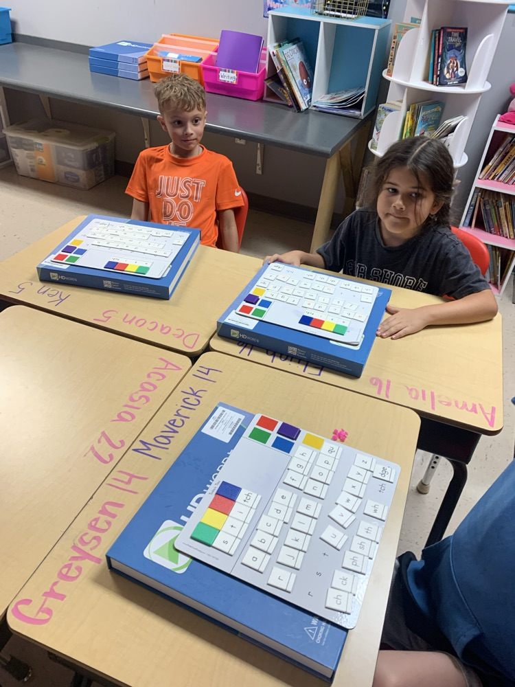 students working on building words