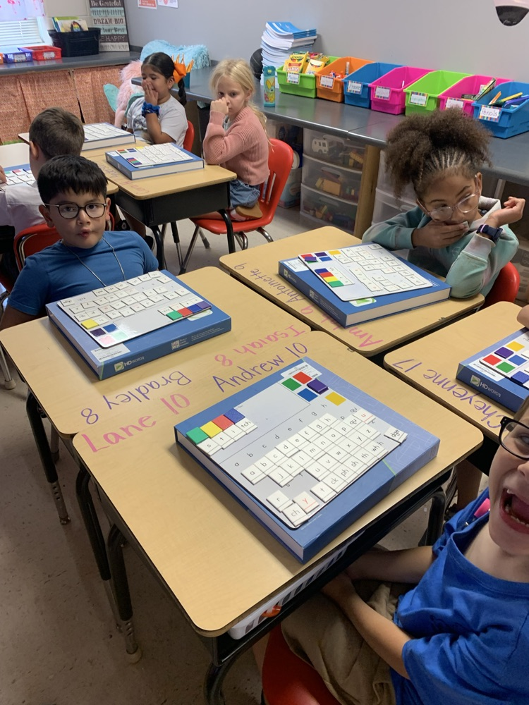 students working on building words