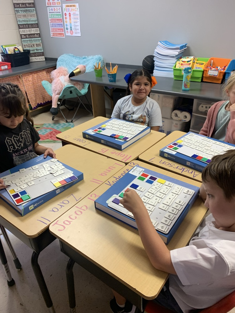 students working on building words