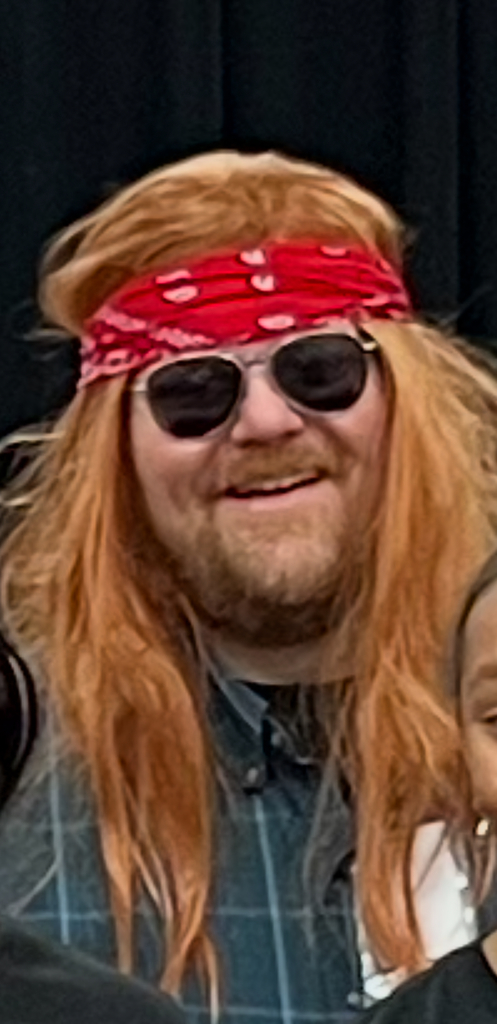 Mr. Tudyk as Brett Michael