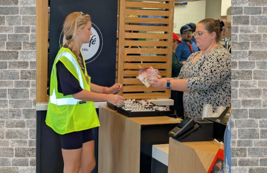 Mrs. Carlton paying for her Happy Meal