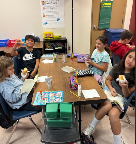 Mrs. Shaws class eating donuts