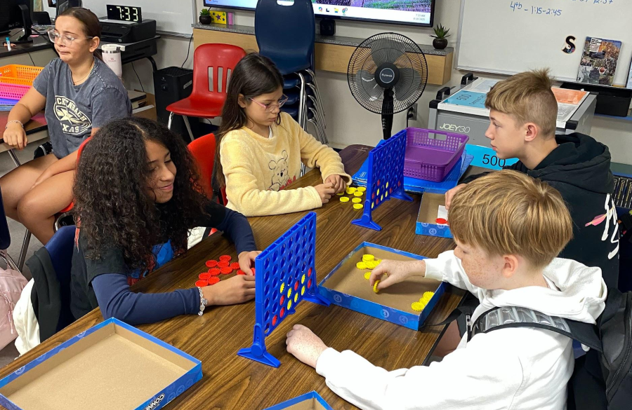 picture of students playing community building games together