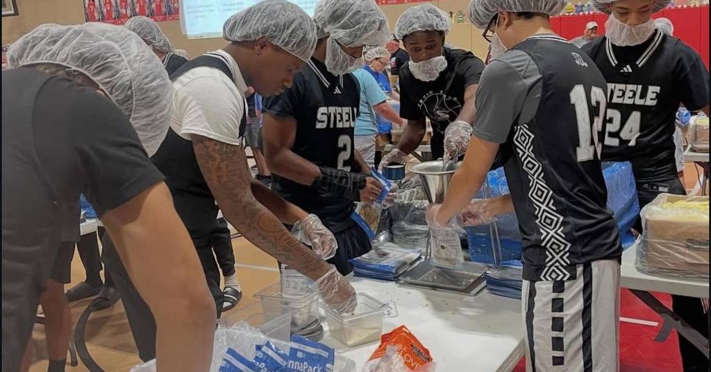 Team working together to fill bags.