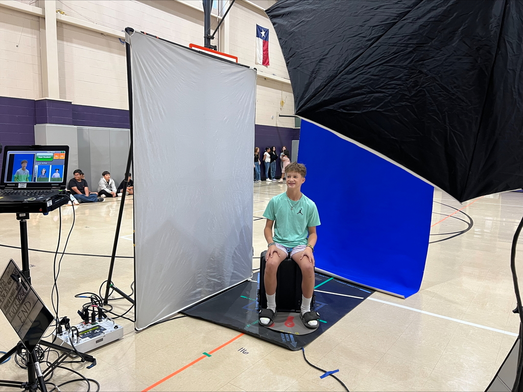 Student posing for yearbook picture