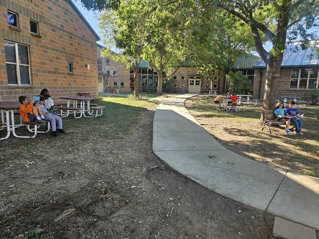Wildcats enjoyed this beautiful morning while reading a book in the courtyard.