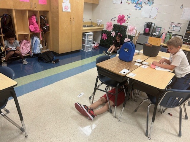 Students reading in the classroom