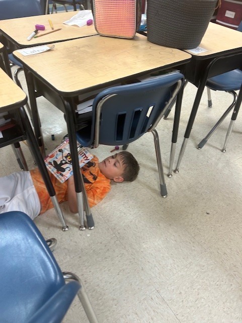 Students reading in the classroom