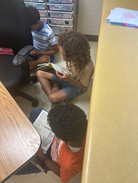 Students reading in the classroom