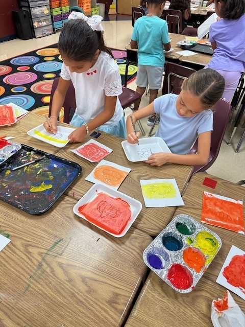 3rd graders making magic in art!