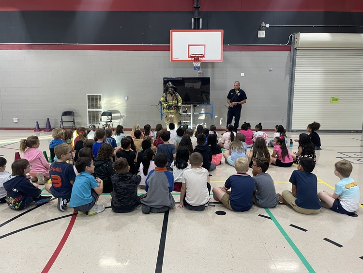students watching firefighter presentation