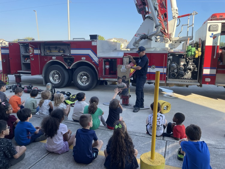 students watching firefighter presentation