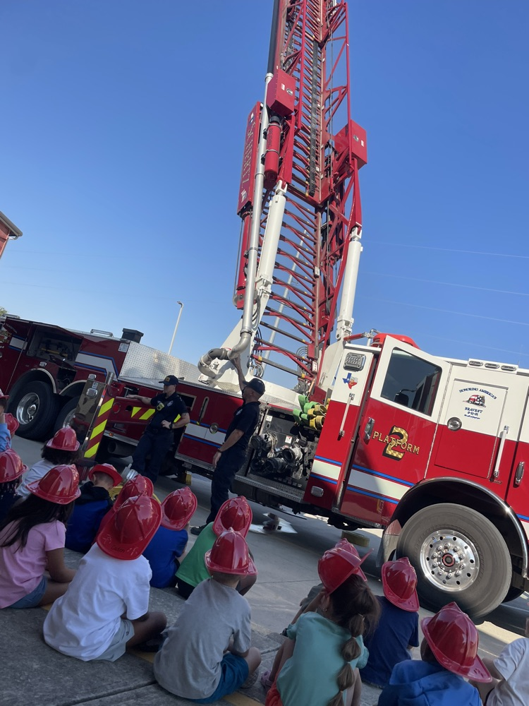 students watching firefighter presentation