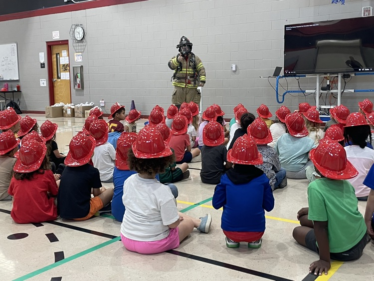 students watching firefighter presentation