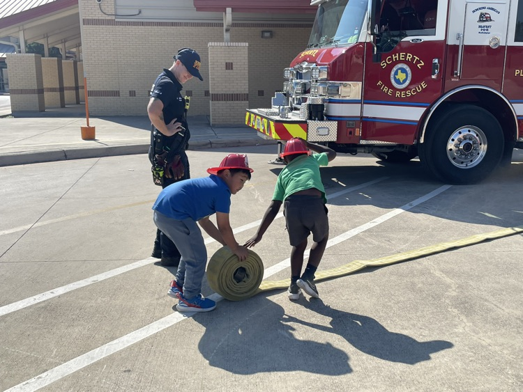 students watching firefighter presentation