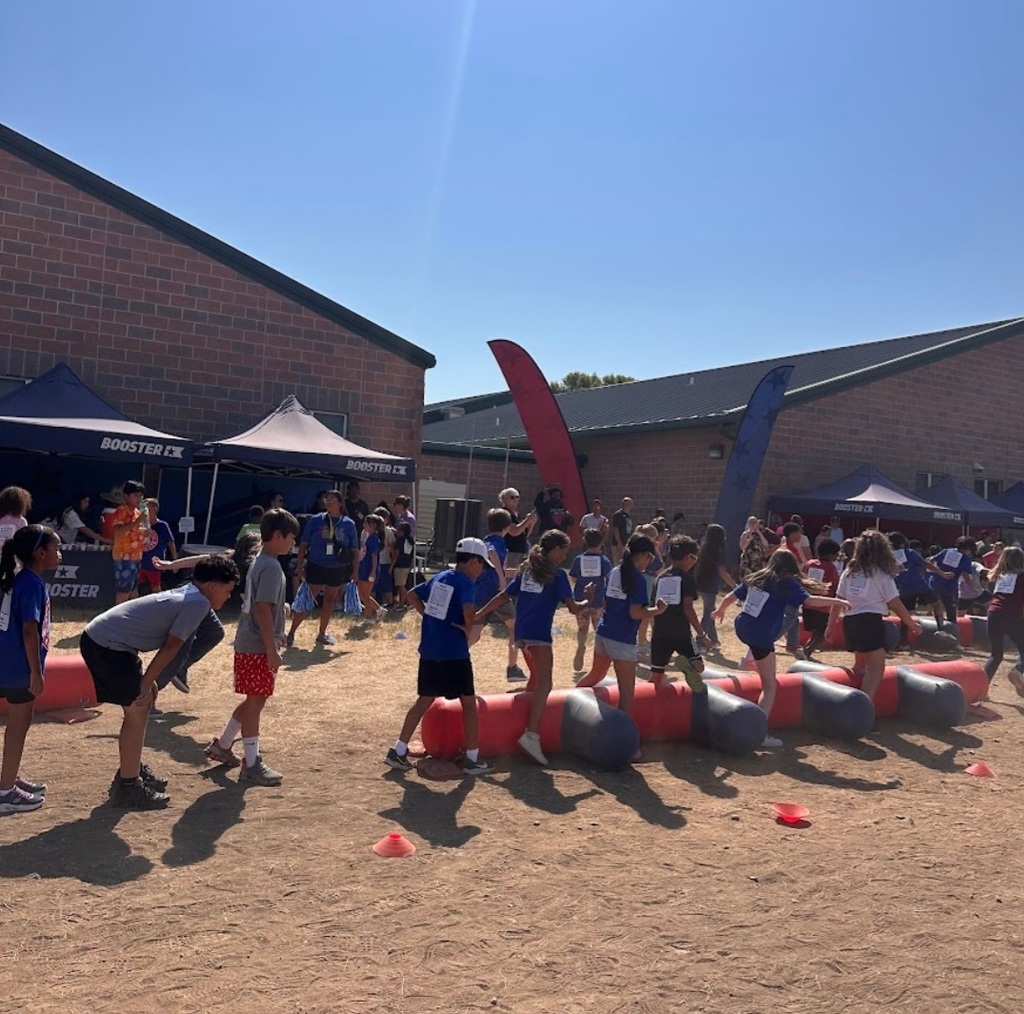 Wildcats having a BLAST at the Obstacle Run!