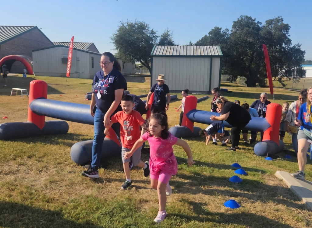 Wildcats having a BLAST at the Obstacle Run!