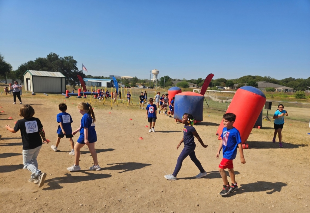 Wildcats having a BLAST at the Obstacle Run!