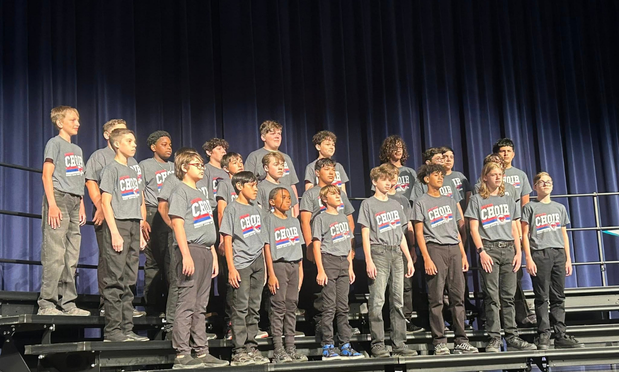 Choir students on risers ready for their performance