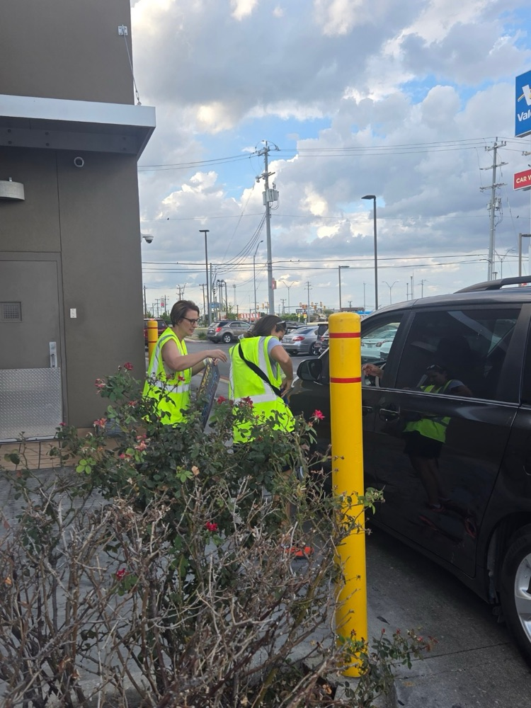 Solar staff taking McDonald orders outside