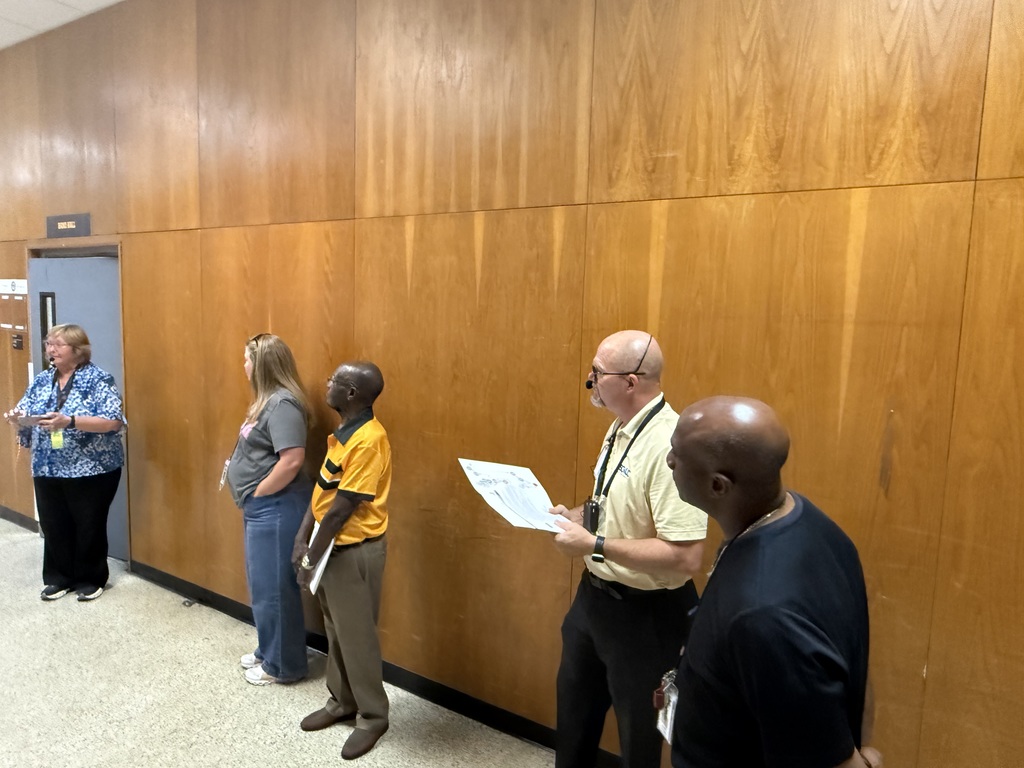 Inspecting the outdated choir and orchestra rooms at Dobie JHS