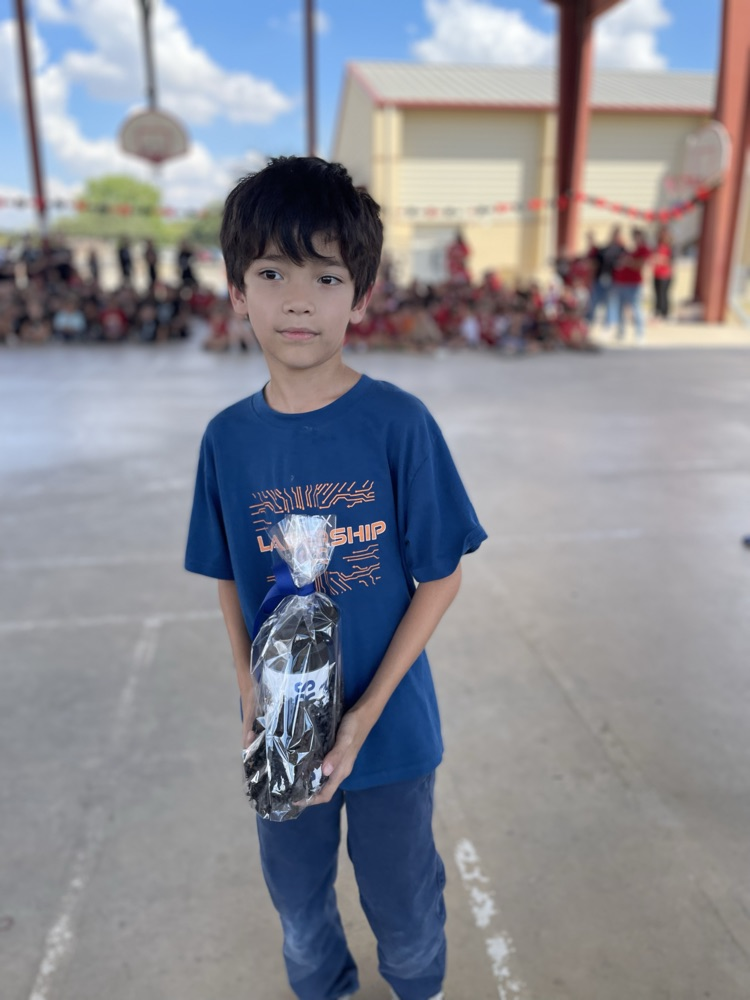 student receiving award for most house points earned