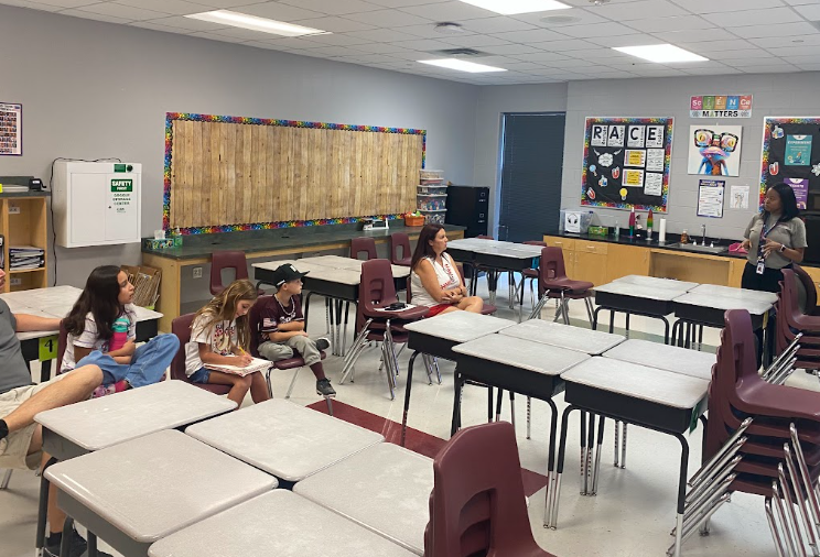 Mrs jackson talking with parents 