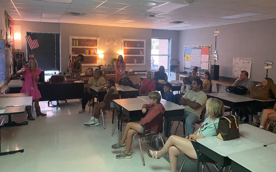 Mrs Housley talking with parents 