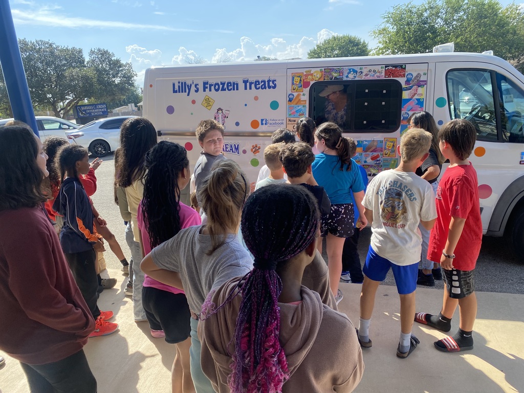picture of students in line to get ice cream from an ice cream truck