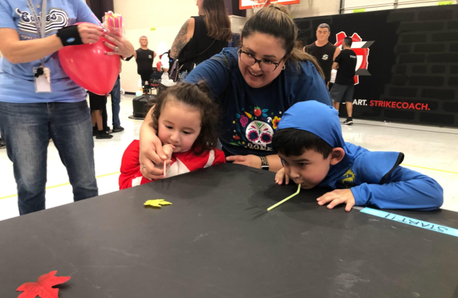 picture of students and their families enjoying the fall festival