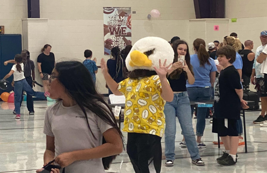 picture of students and their families enjoying the fall festival