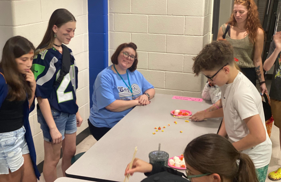 picture of students and their families enjoying the fall festival