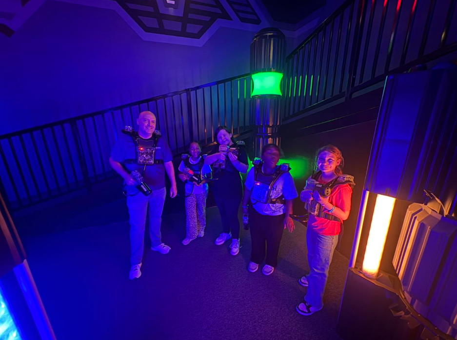 Wilder students playing laser tag with principal