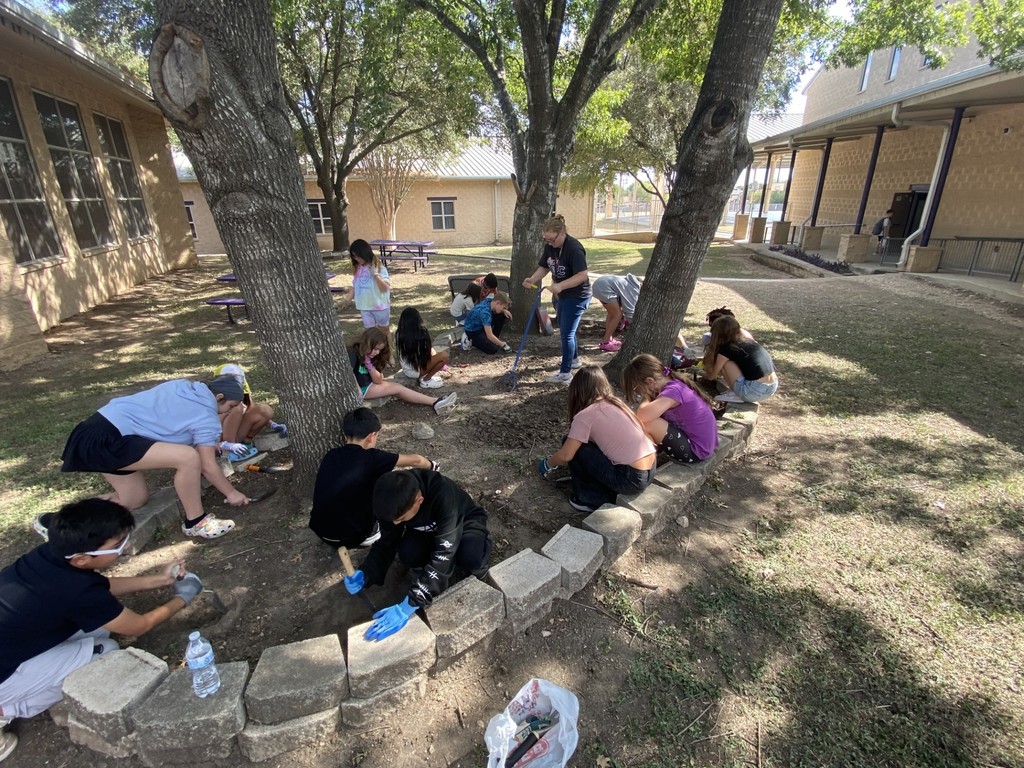 students prepping the garden