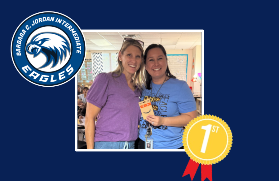 picture of Mrs. Hoffpauir being awarded a gift card for her class winning 1st place in coin wars