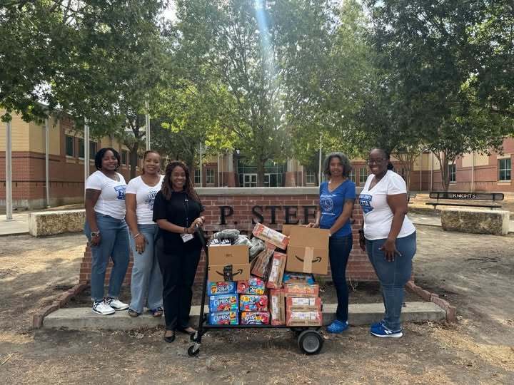 CIS accepts donations from Gama Alpha Chi Zeta 