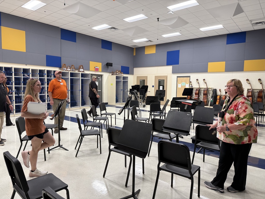 Beth Bronk, Fine Arts Director, proudly shows off the Orchestra room at Clemens HS.