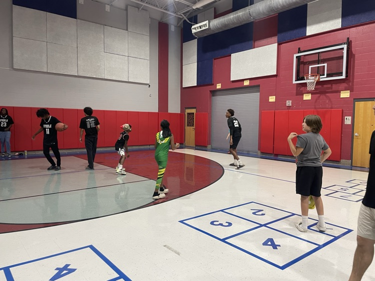 students playing basketball 