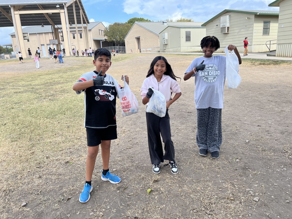 students picking up trash