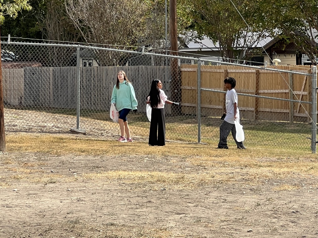 girls cleaning up at recess