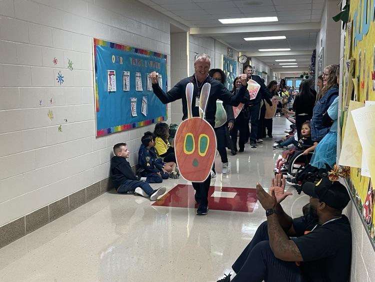 Sippel character parade with students and teachers dressed up 