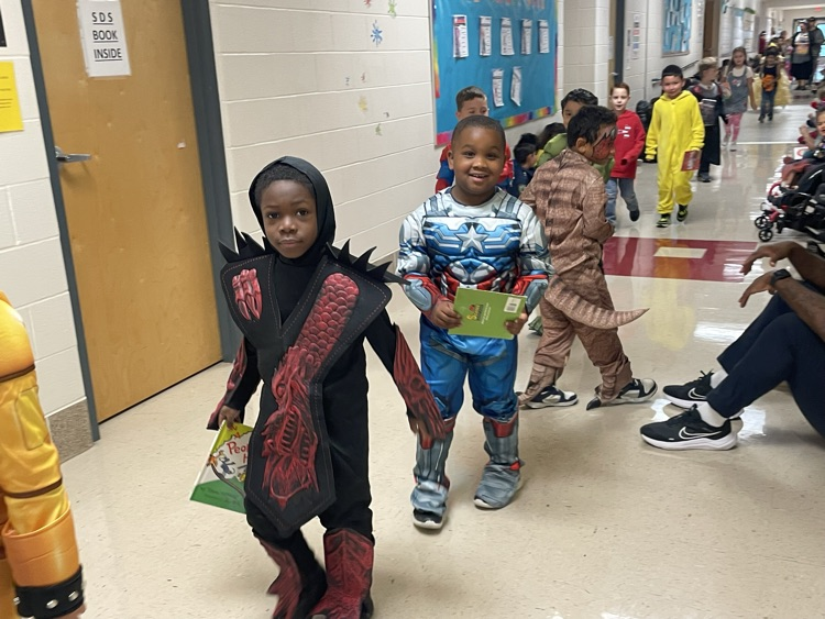 Sippel character parade with students and teachers dressed up 